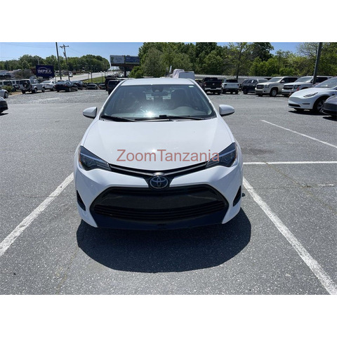 I would like to sell my 2019 Toyota Corolla LE - 2/3